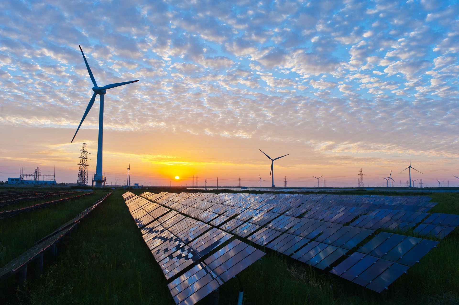 The power of the Sun and Wind Solar & Wind Energy at Sunset